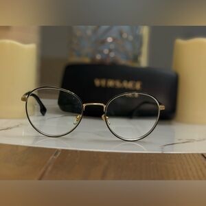 Versace women's Glasses in Black and Gold